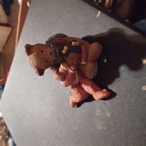 Two paintings in a frame with glass on the painters name the artist's name is an